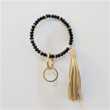 Load image into Gallery viewer, Bracelet keychain is 10" and includes a detachable key ring and a decorative tassel.  Comes in white/gold, black/gold and copper/gold.