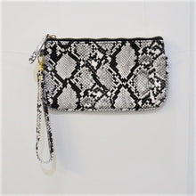 Load image into Gallery viewer, Clutch 5" x 8-1/4" with matching zipper tag and wrist handle. 4 prints available Black Snakeskin, Brown Snakeskin, Leopard and Black with Yellow flowers.