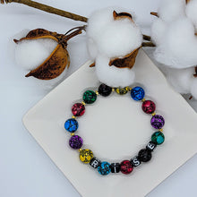 Load image into Gallery viewer, This beautiful RISE boost bracelet has colorful marbled beads with gold bead accents.  The word Rise can mean several things; to move upward, to respond warmly, to move upward: ascend and several other things according to Merriam-Webster. For us, this bracelet is meant to boost your confidence in whatever meaning YOU need it to.  Rise to the Challenge * Rise in your Faith * Rise to Uplift Others