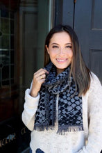 Load image into Gallery viewer, Changing up the quintessential black scarf with this chic black snakeskin fringe scarf is a Can Do! This scarf has a wonderful feel to it &amp; the length makes it versatile. 
