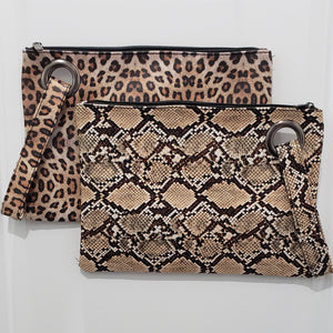 Grand Clutch 8-3/4" x 12" Zipper closure Matching wrist strap 3 interior pockets 2 prints Brown Snakeskin and Leopard