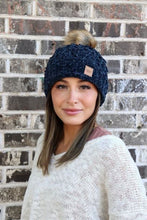 Load image into Gallery viewer, This Navy Chenille Beanie absolutely draws attention! You don&#39;t even need to touch this beanie to see how soft, comfortable, &amp; warm (fleece lining) it is. And the faux fur pom adds the right amount of Sas! 
