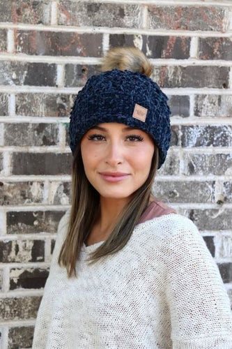 This Navy Chenille Beanie absolutely draws attention! You don't even need to touch this beanie to see how soft, comfortable, & warm (fleece lining) it is. And the faux fur pom adds the right amount of Sas! 