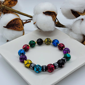 This beautiful RISE boost bracelet has colorful marbled beads with gold bead accents.  The word Rise can mean several things; to move upward, to respond warmly, to move upward: ascend and several other things according to Merriam-Webster. For us, this bracelet is meant to boost your confidence in whatever meaning YOU need it to.  Rise to the Challenge * Rise in your Faith * Rise to Uplift Others