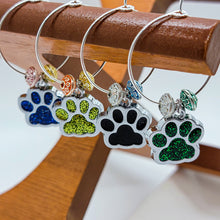 Load image into Gallery viewer, There&#39;s no denying that there are quite a few Dog/Cat Mom&#39;s that are wine lovers too! We&#39;ve enjoyed adding these paw print wine charms to our wine accessories. Each paw print is a different color and the accent beads are colorful too. These paw charms are definitely a step in the right direction to add some joy to your event! Set of 8.
