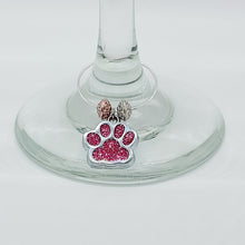 Load image into Gallery viewer, There&#39;s no denying that there are quite a few Dog/Cat Mom&#39;s that are wine lovers too! We&#39;ve enjoyed adding these paw print wine charms to our wine accessories. Each paw print is a different color and the accent beads are colorful too. These paw charms are definitely a step in the right direction to add some joy to your event! Set of 8.
